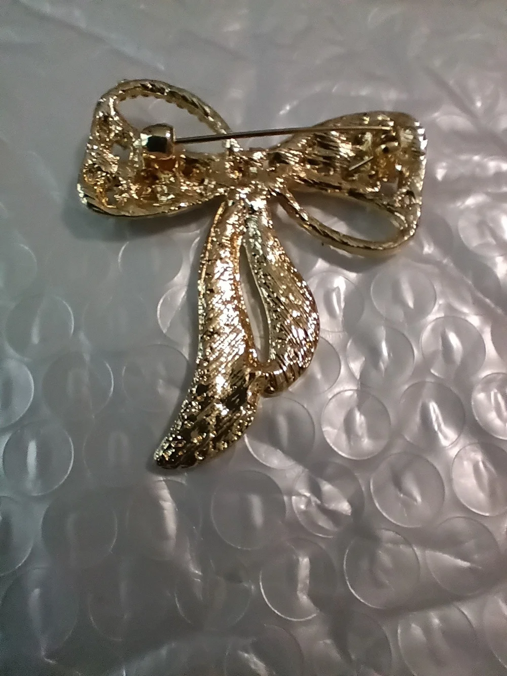 Gold-Tone Bow Brooch with Clear Crystals - Elegant Women’s Jewelry